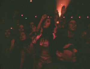 Schoolgirl Anna Chen at David Bowie’s legendary “farewell” Hammersmith Odeon concert, 1973. Still from DA Pennebaker’s Ziggy Stardust movie. (Genaro Simancas)